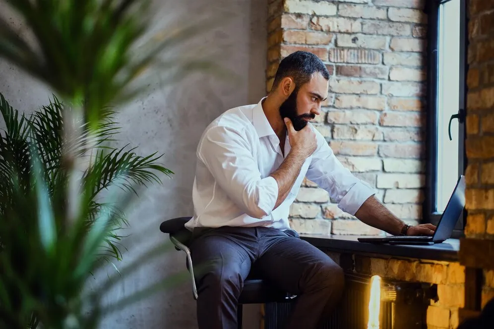 male-works-with-laptop